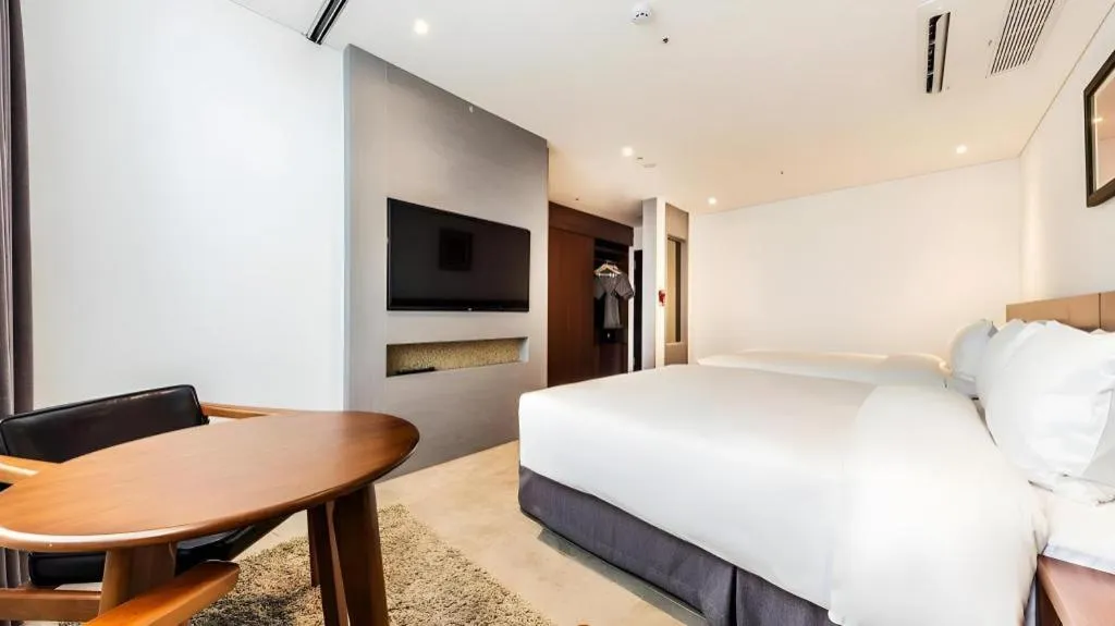 Bed in CS Premier Hotel