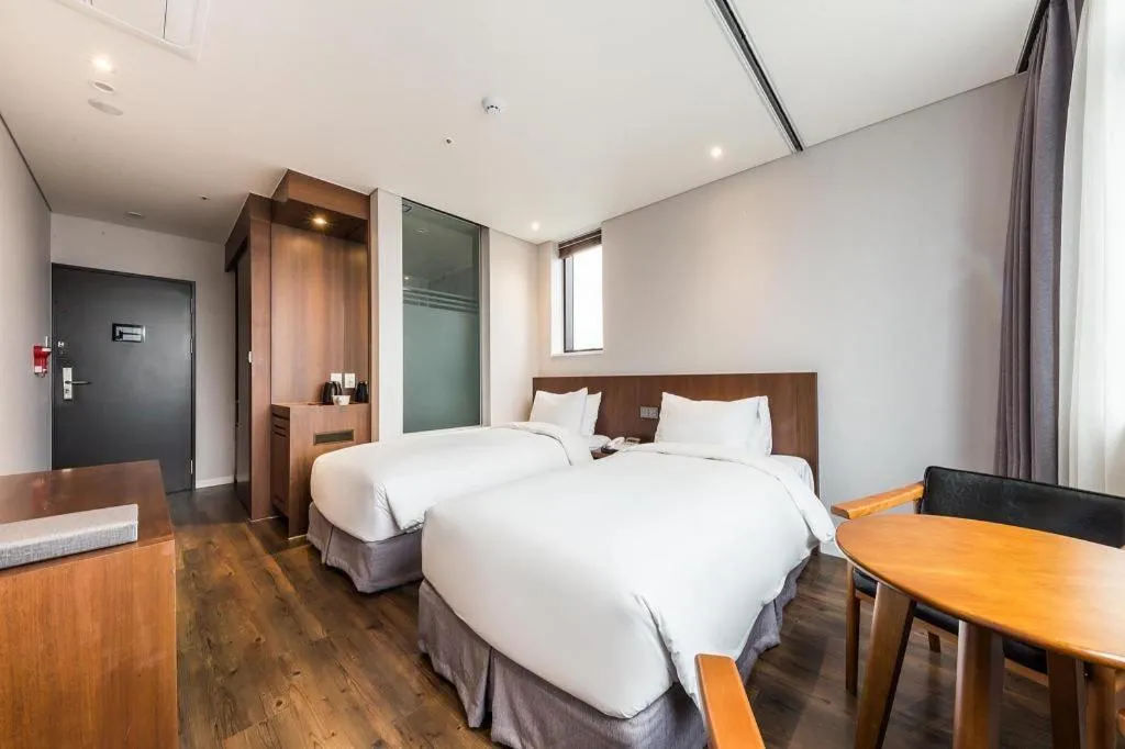 Bed in CS Premier Hotel