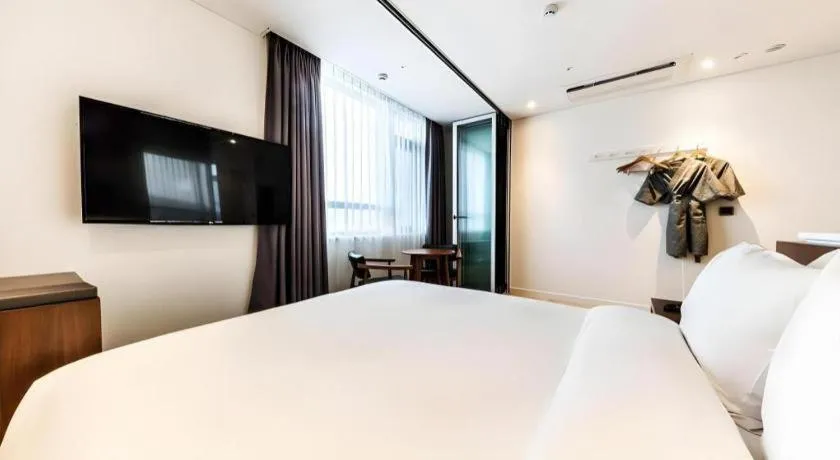 Bed in CS Premier Hotel