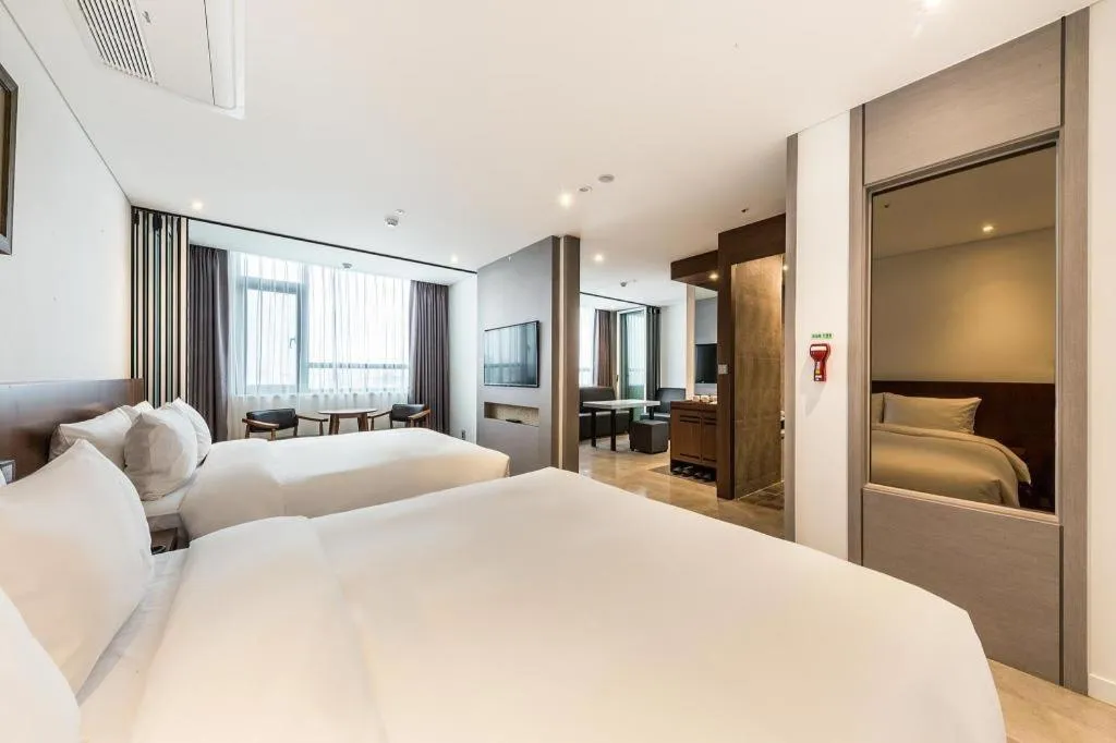 Bed in CS Premier Hotel