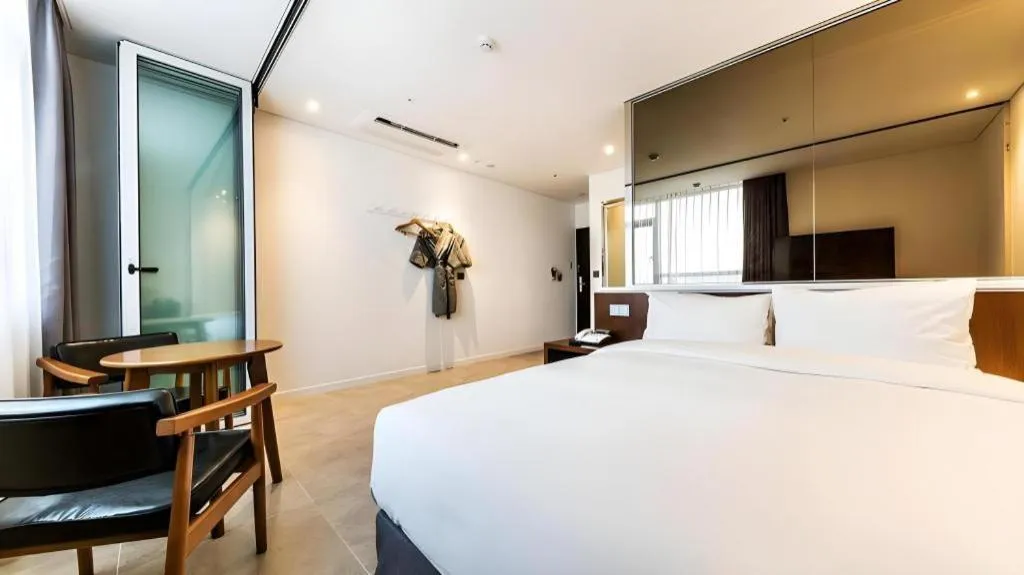 Bed in CS Premier Hotel