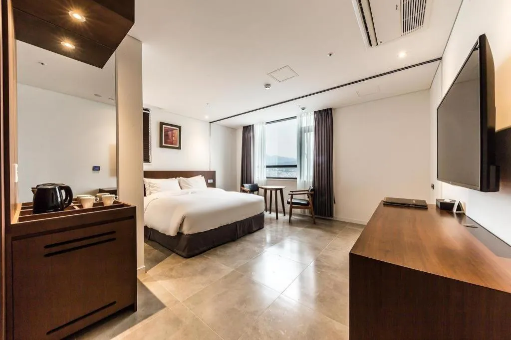 Bed in CS Premier Hotel