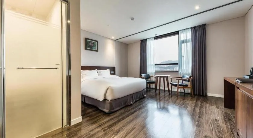 Bed in CS Premier Hotel