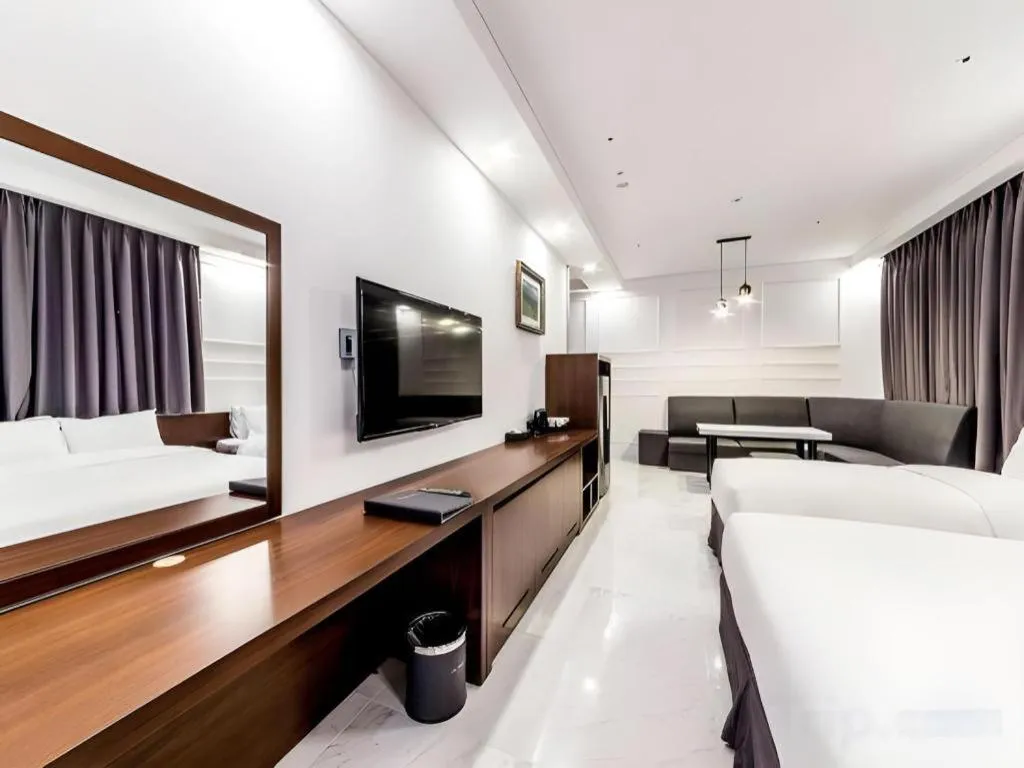 Bed in CS Premier Hotel