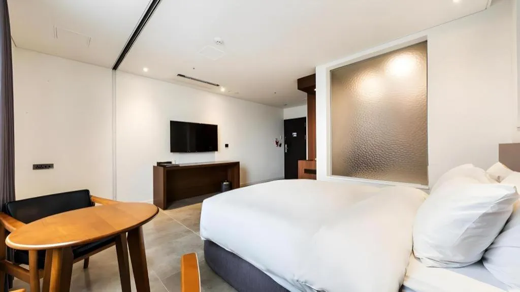 Bed in CS Premier Hotel