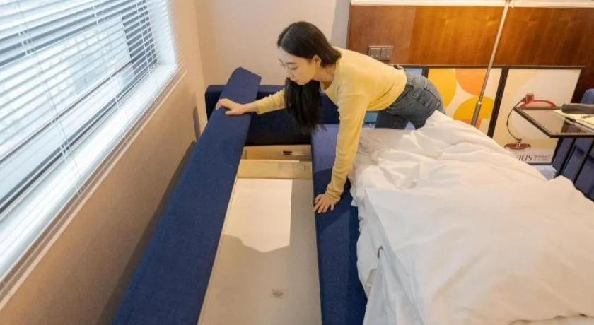 Bed in CS Premier Hotel