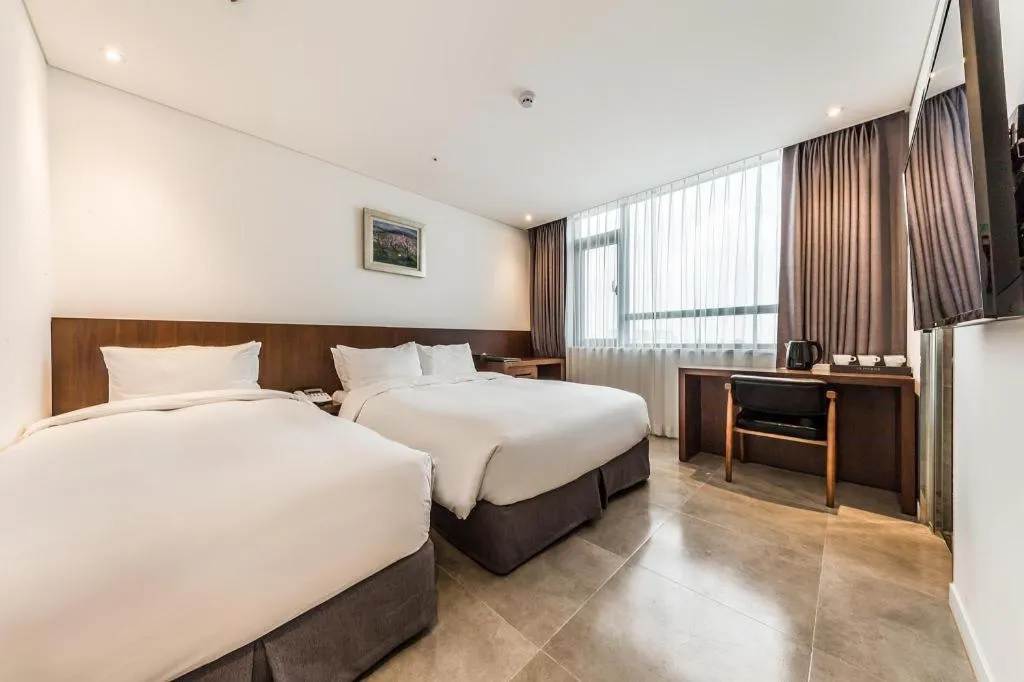 Bed in CS Premier Hotel