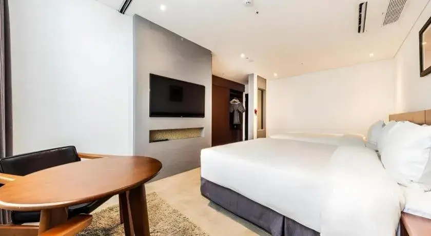 Bed in CS Premier Hotel Bed in CS Premier Hotel