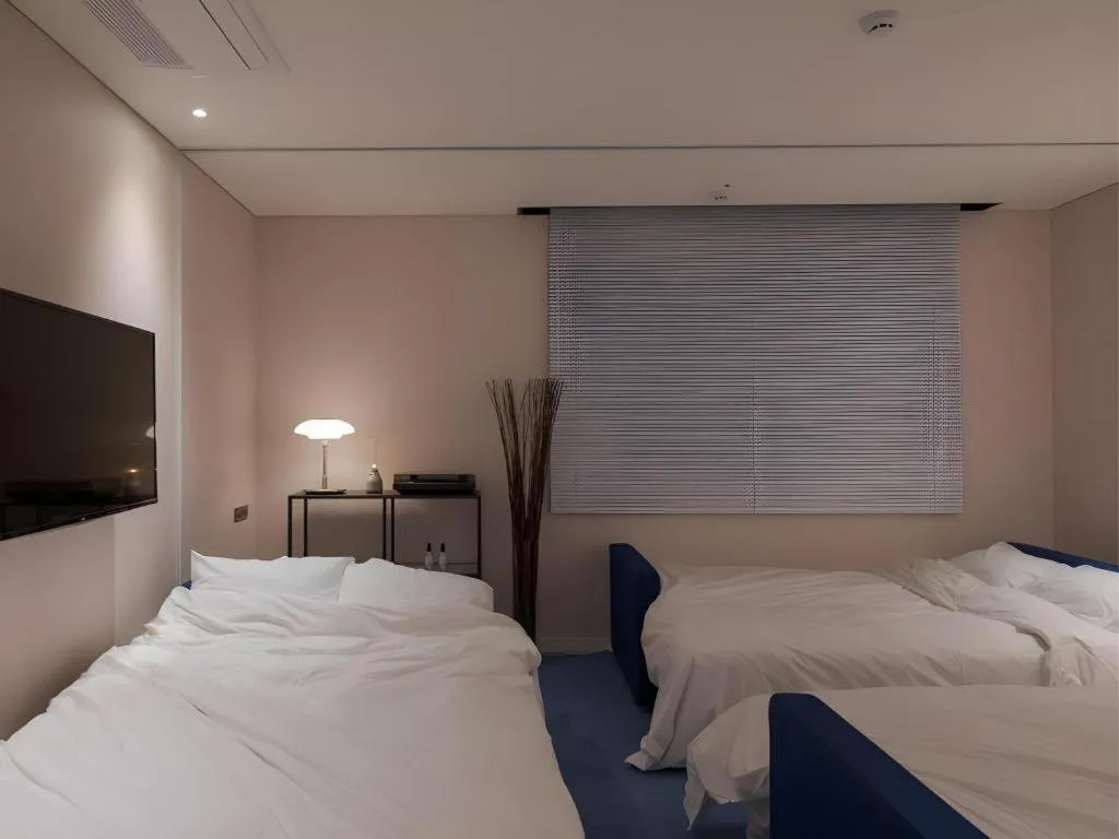 Bed in CS Premier Hotel