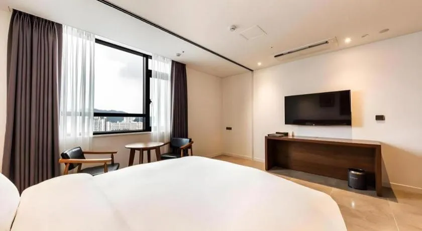 Bed in CS Premier Hotel