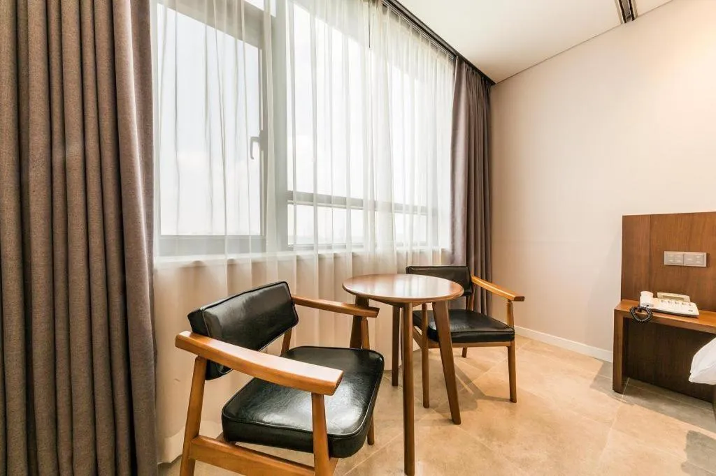 Bed in CS Premier Hotel