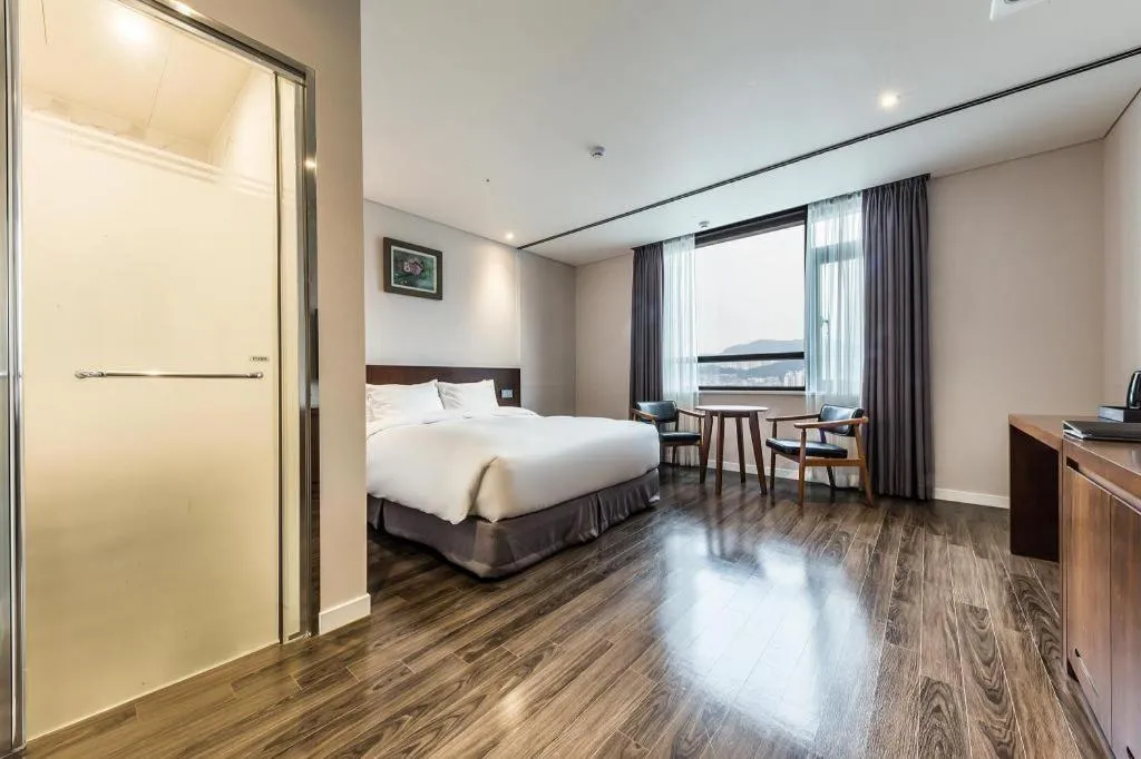 Bed in CS Premier Hotel