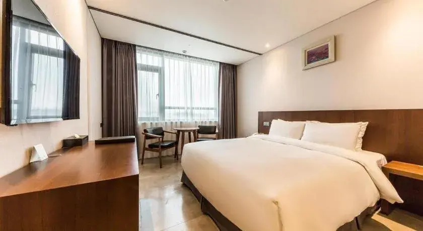 Bed in CS Premier Hotel Bed in CS Premier Hotel