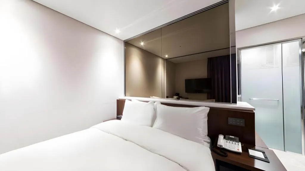 Bed in CS Premier Hotel