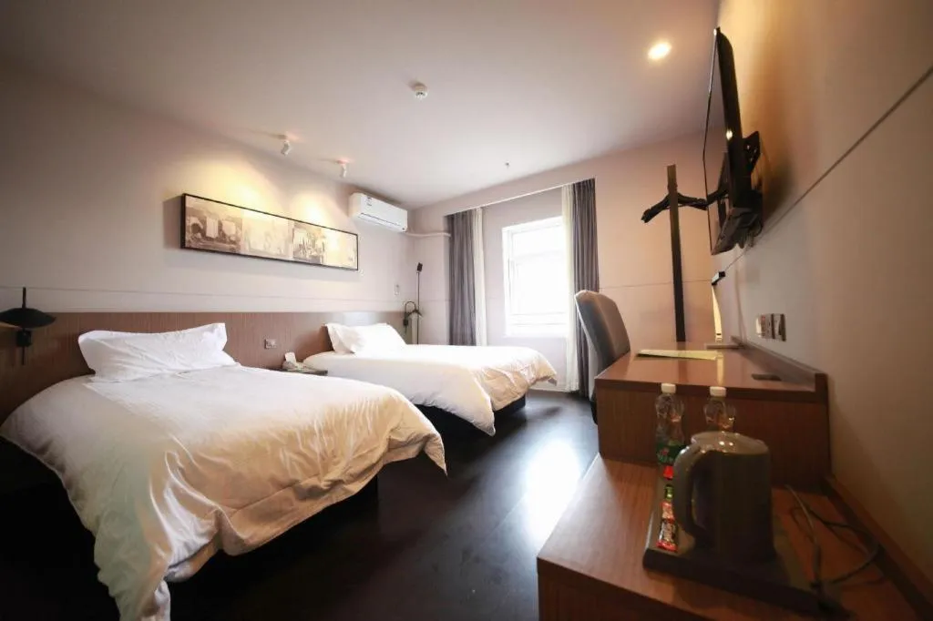 Bed in Jinjiang Inn Select Shenyang Tawan Xingshun Night Market Metro Station