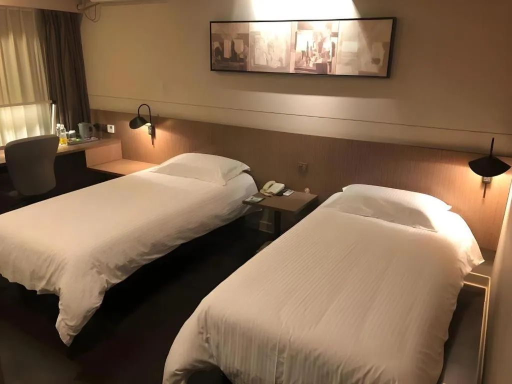 Bed in Jinjiang Inn Select Shenyang Tawan Xingshun Night Market Metro Station