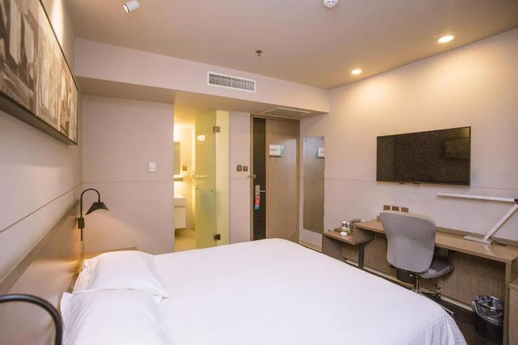 Bed in Jinjiang Inn Select Shenyang Tawan Xingshun Night Market Metro Station