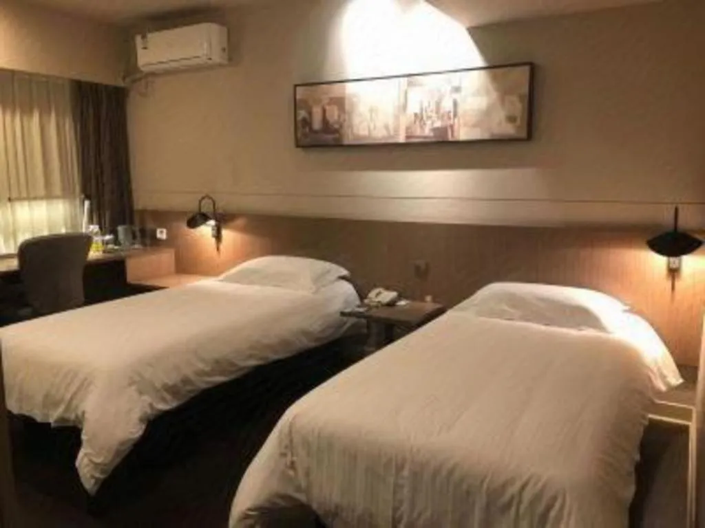 Bed in Jinjiang Inn Select Shenyang Tawan Xingshun Night Market Metro Station