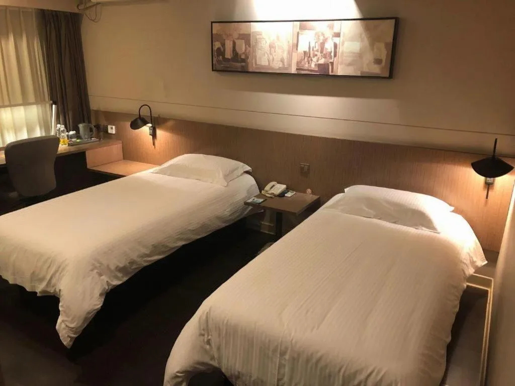 Bed in Jinjiang Inn Select Shenyang Tawan Xingshun Night Market Metro Station