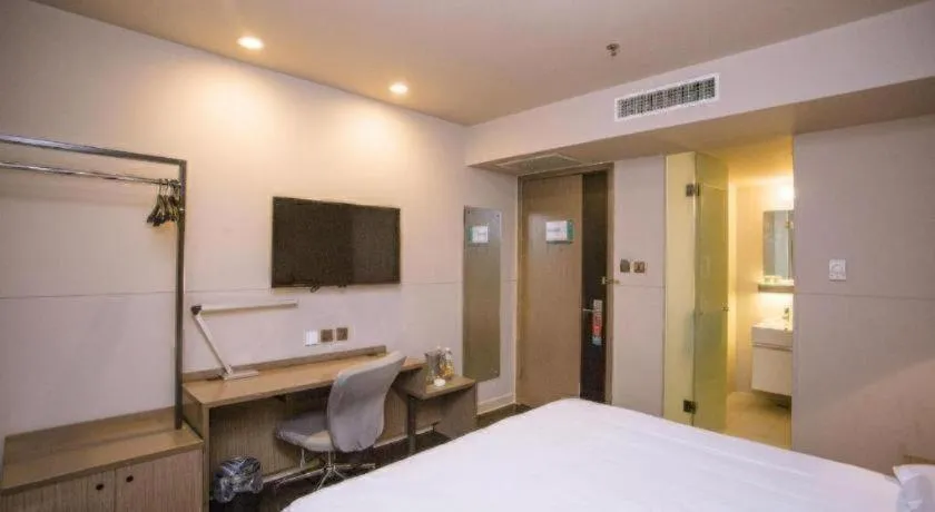 Bed in Jinjiang Inn Select Shenyang Tawan Xingshun Night Market Metro Station