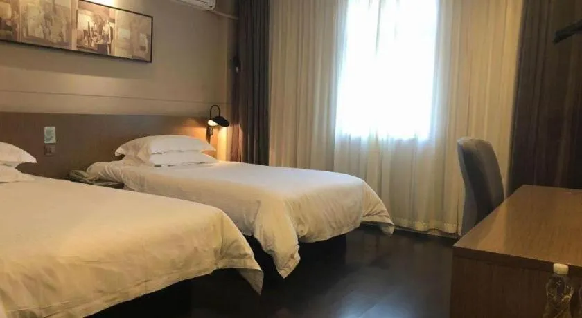 Bed in Jinjiang Inn Select Shenyang Tawan Xingshun Night Market Metro Station