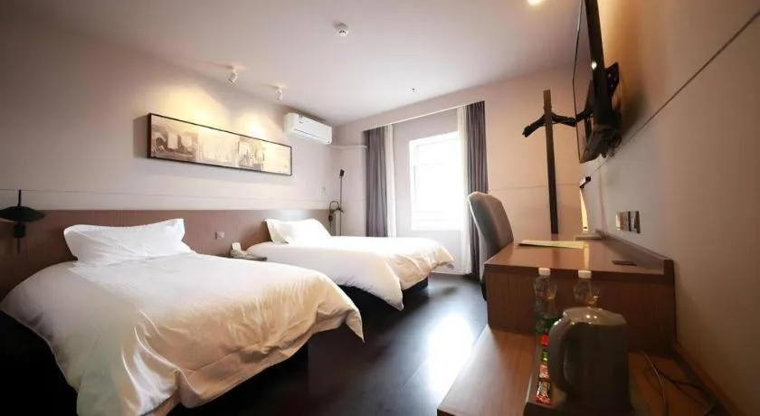Bed in Jinjiang Inn Select Shenyang Tawan Xingshun Night Market Metro Station