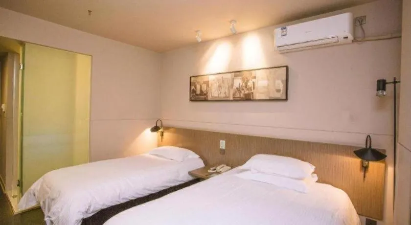 Bed in Jinjiang Inn Select Shenyang Tawan Xingshun Night Market Metro Station