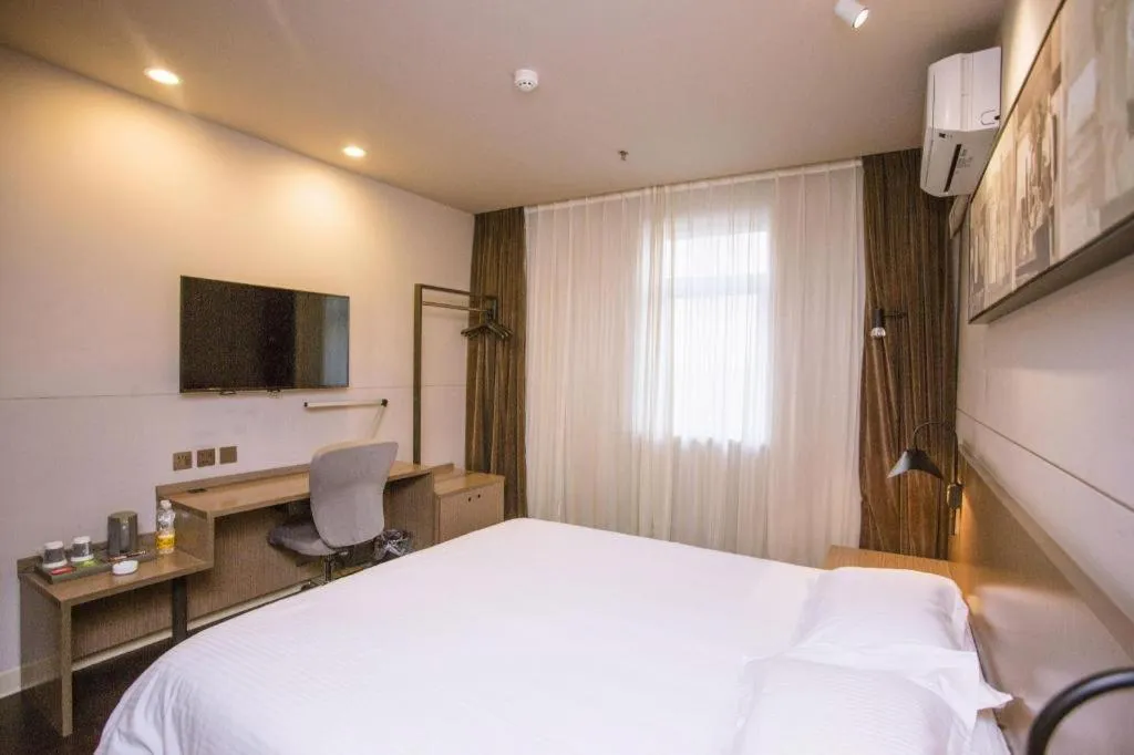 Bed in Jinjiang Inn Select Shenyang Tawan Xingshun Night Market Metro Station