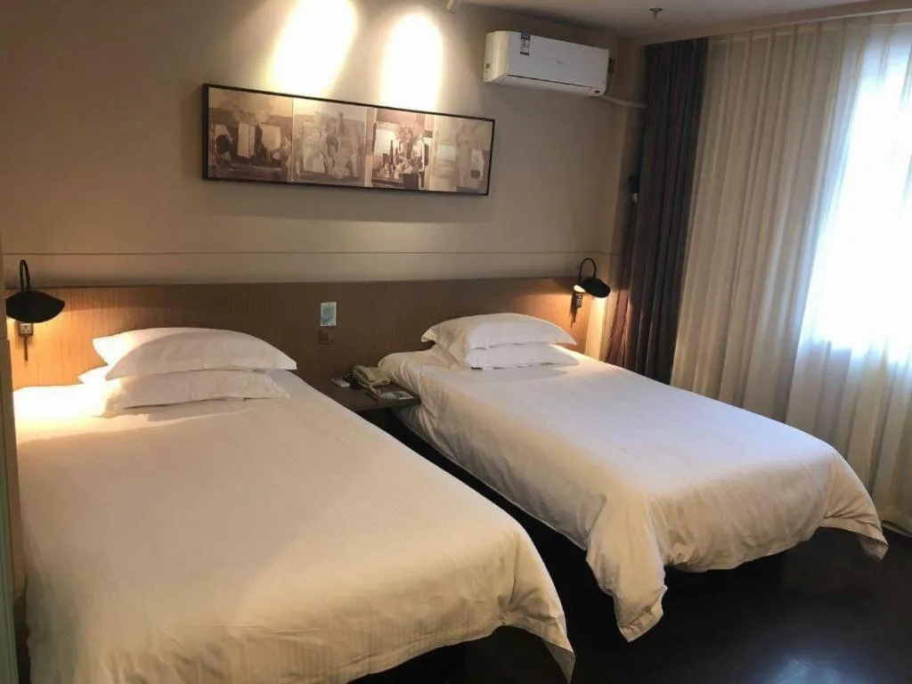 Bed in Jinjiang Inn Select Shenyang Tawan Xingshun Night Market Metro Station
