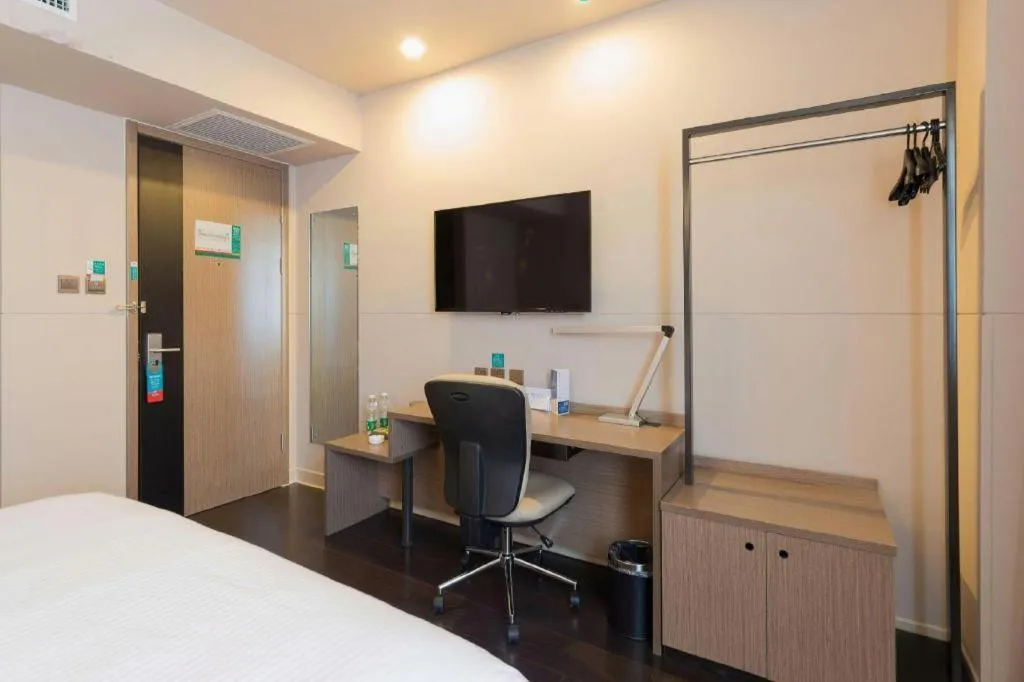 Bed in Jinjiang Inn Select Shenyang Tawan Xingshun Night Market Metro Station