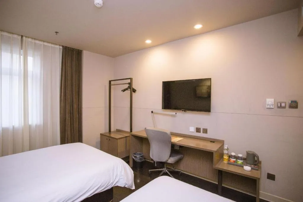 Bed in Jinjiang Inn Select Shenyang Tawan Xingshun Night Market Metro Station