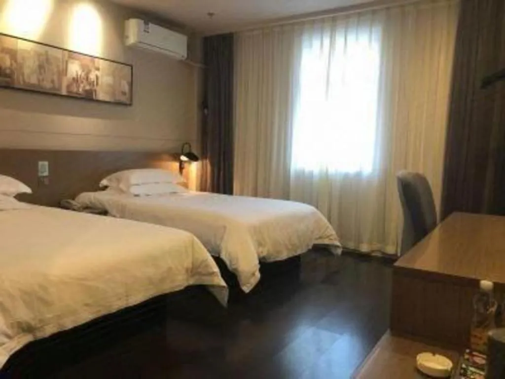 Bed in Jinjiang Inn Select Shenyang Tawan Xingshun Night Market Metro Station