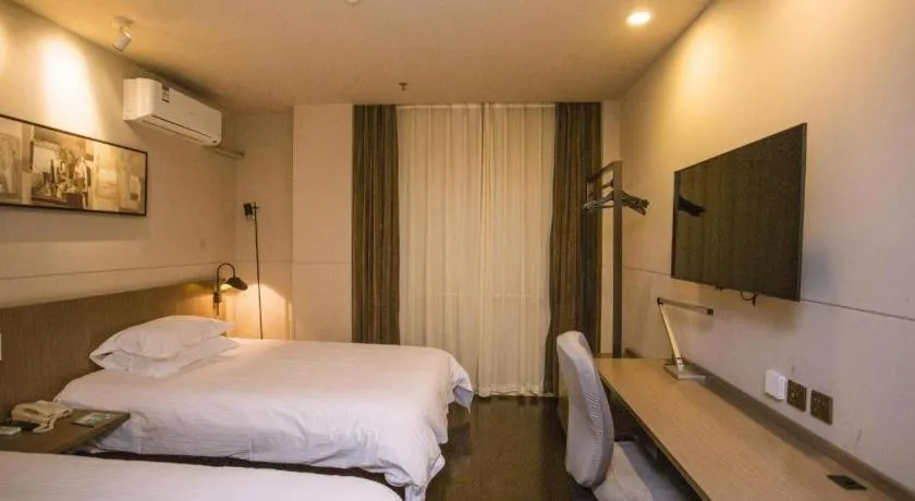 Bed in Jinjiang Inn Select Shenyang Tawan Xingshun Night Market Metro Station