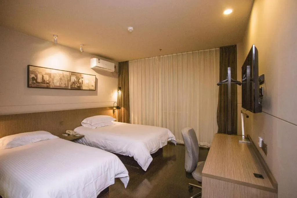 Bed in Jinjiang Inn Select Shenyang Tawan Xingshun Night Market Metro Station