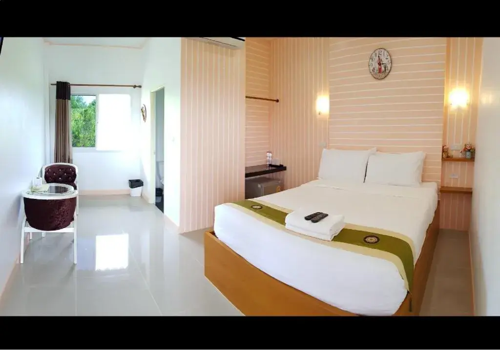 Bed in The Aam resort Bed in The Aam resort