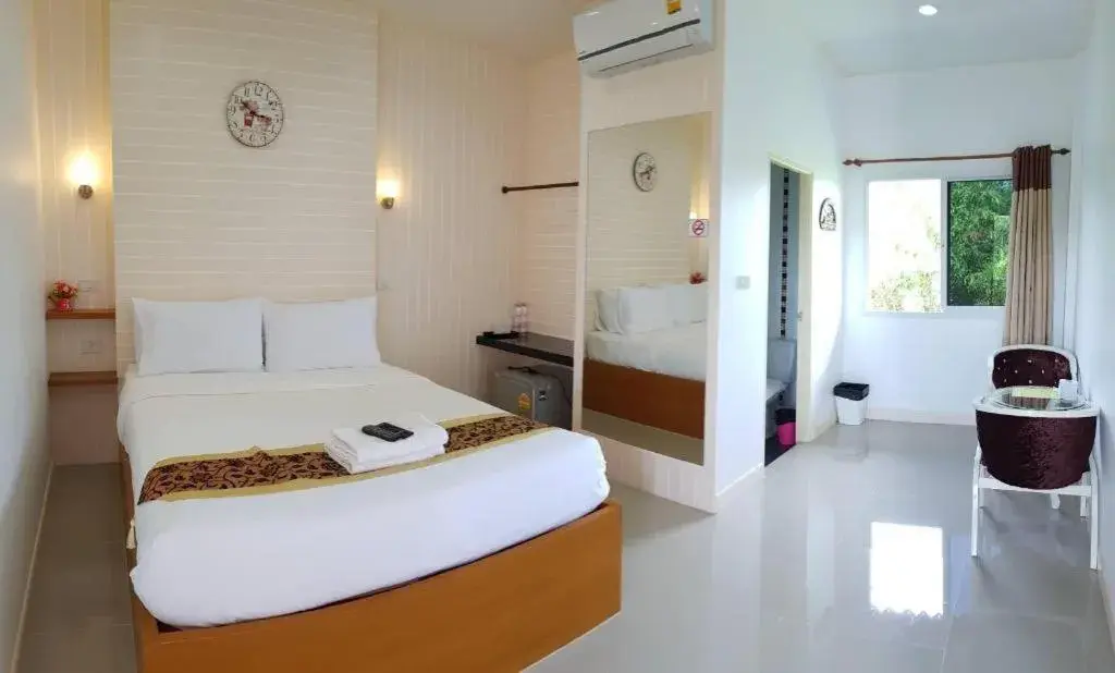 Bed in The Aam resort Bed in The Aam resort