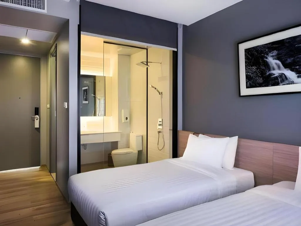 Bed in R Photo Hotel