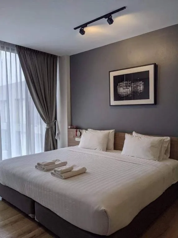 Bed in R Photo Hotel