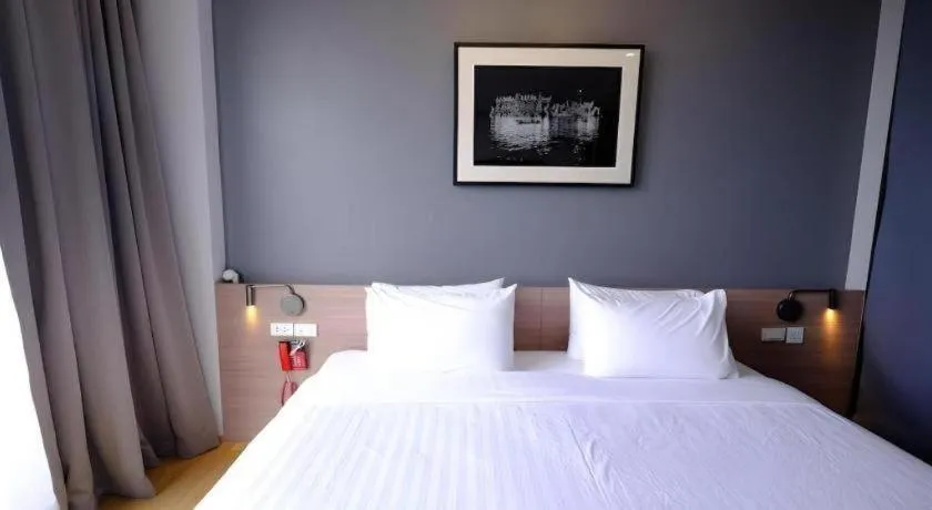 Bed in R Photo Hotel