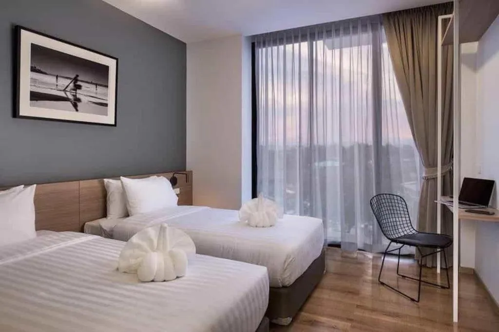 Bed in R Photo Hotel