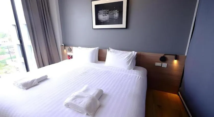 Bed in R Photo Hotel