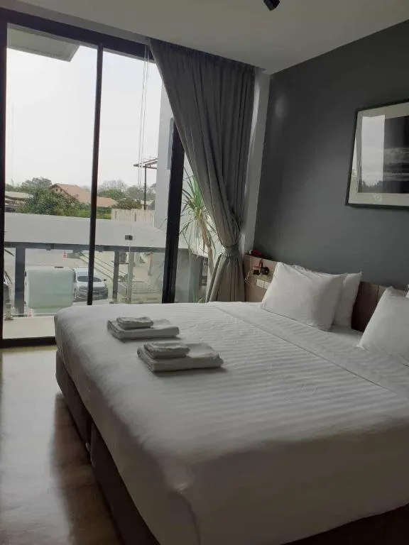 Bed in R Photo Hotel