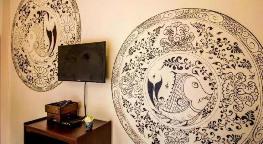 Wake Up at Muang Kao Boutique Hotel