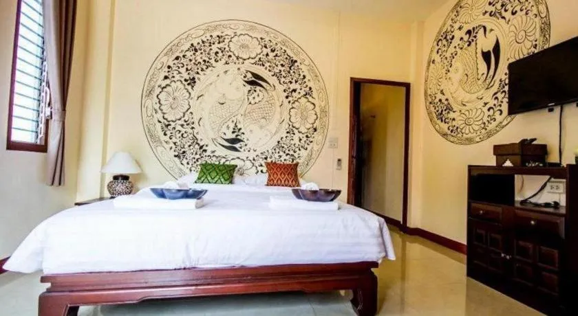 Bed in Wake Up at Muang Kao Boutique Hotel