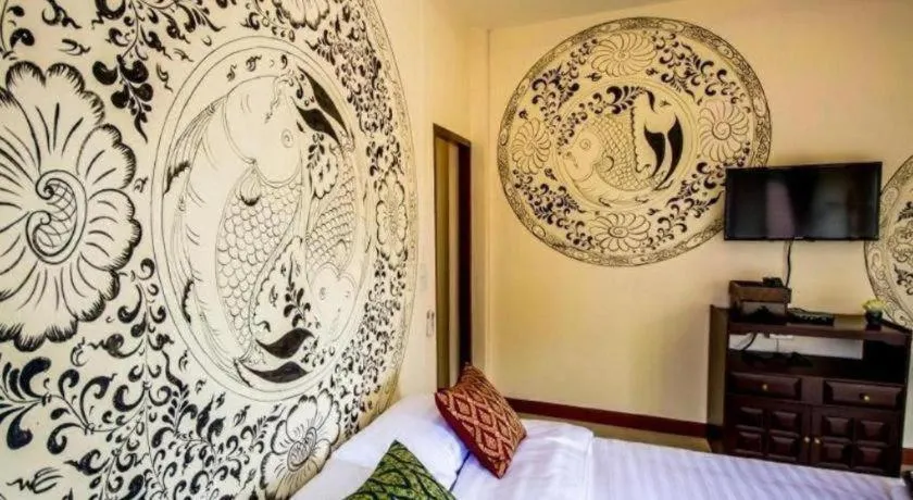 Bed in Wake Up at Muang Kao Boutique Hotel