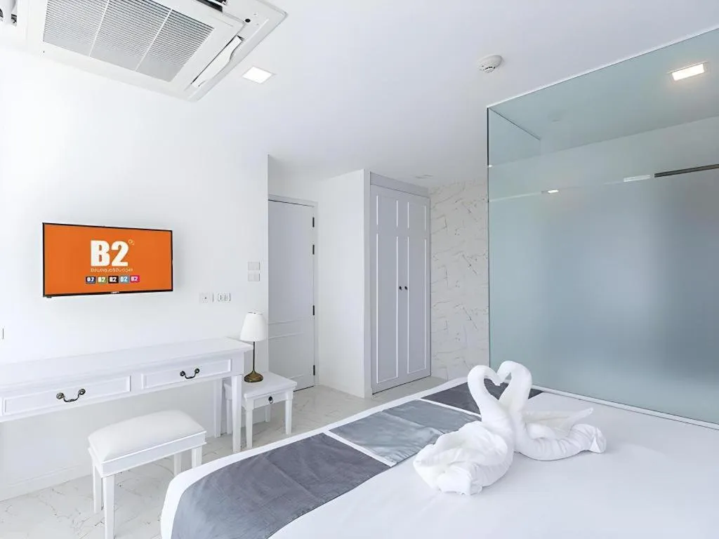 Bed in B2 Hua Hin Premier Hotel