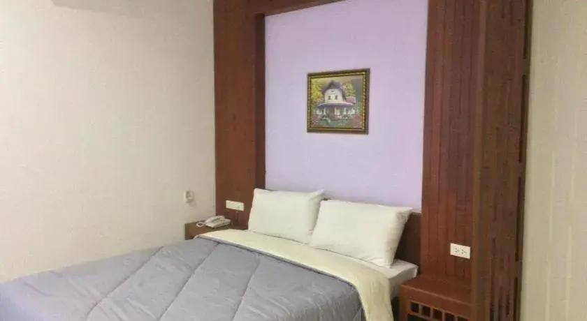 Bed in Suanrak Resort Bed in Suanrak Resort