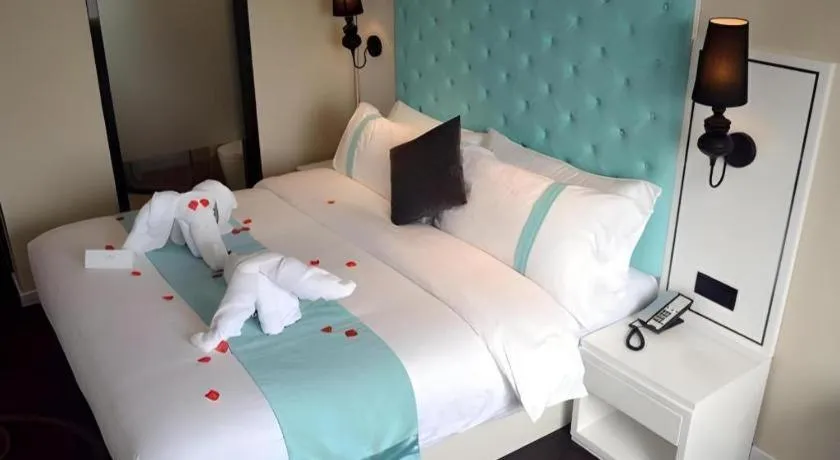 Bed in Xana Hotelle Beijing Qianmen Footbridge Metro Station