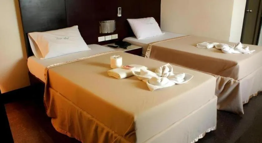Bed in Vista Hotel Cubao