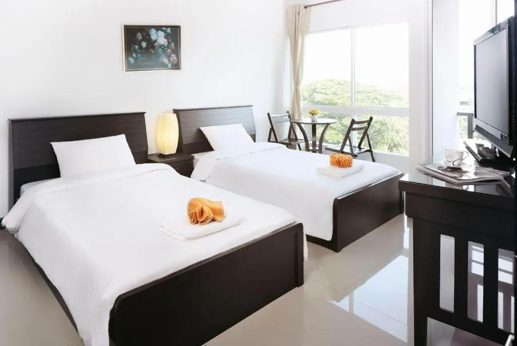 Bed in Baan Payai Resort